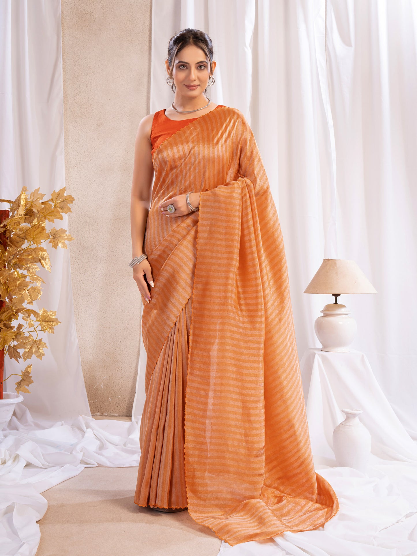Rust Orange Tissue Silk Saree With Zari Borders