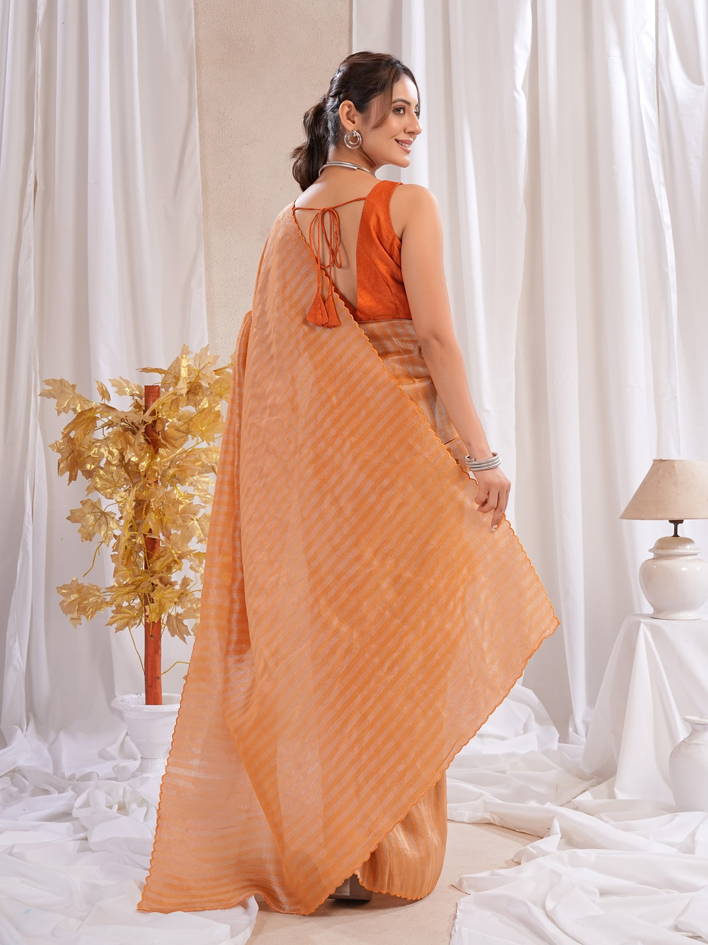 Rust Orange Tissue Silk Saree With Zari Borders